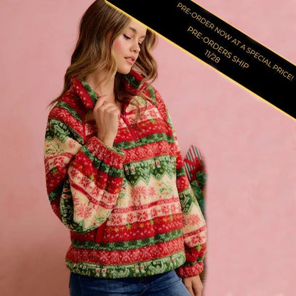 Front view of women's cozy Fair Isle sherpa quarter zip pullover in holiday red, green, and cream.