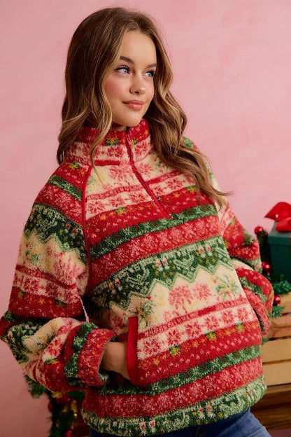 Women's cozy Fair Isle sherpa quarter-zip pullover in red, green, and cream with a high mock collar.