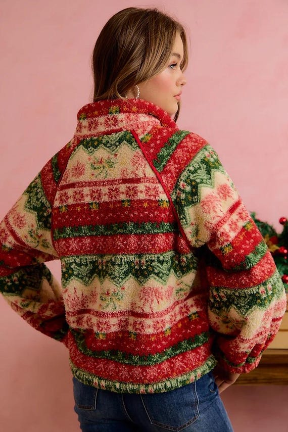 Back view of a women's plush cottagecore Fair Isle sherpa pullover in festive red, green, and cream.