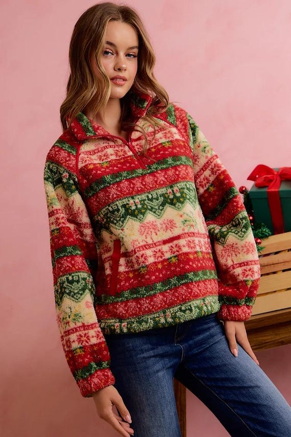 Close-up of plush teddy-soft brushed sherpa fleece material on holiday cottagecore quarter zip top.