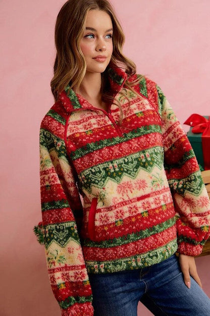 Model wearing cozy Fair Isle pullover with blue jeans for a casual cottagecore winter outfit.