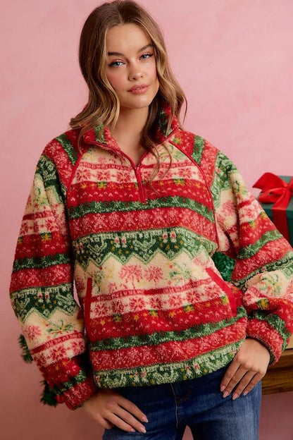 Detailed shot of the half-zip collar on red and green festive cottagecore sherpa fleece sweater.