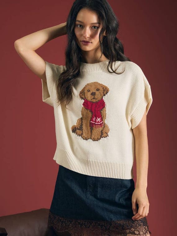 Front view of Women's cream puppy graphic cotton preppy sweater
