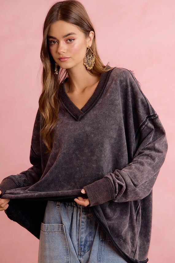 Back view of oversized streetwear pullover with sparkling angel wings